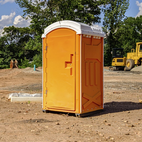 what is the cost difference between standard and deluxe portable restroom rentals in Cortland Indiana